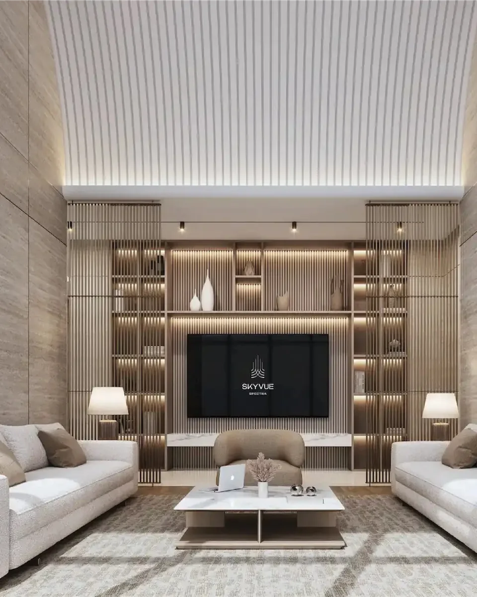 Skyvue Stellar: living room with stone finishes and a central media wall — rendering